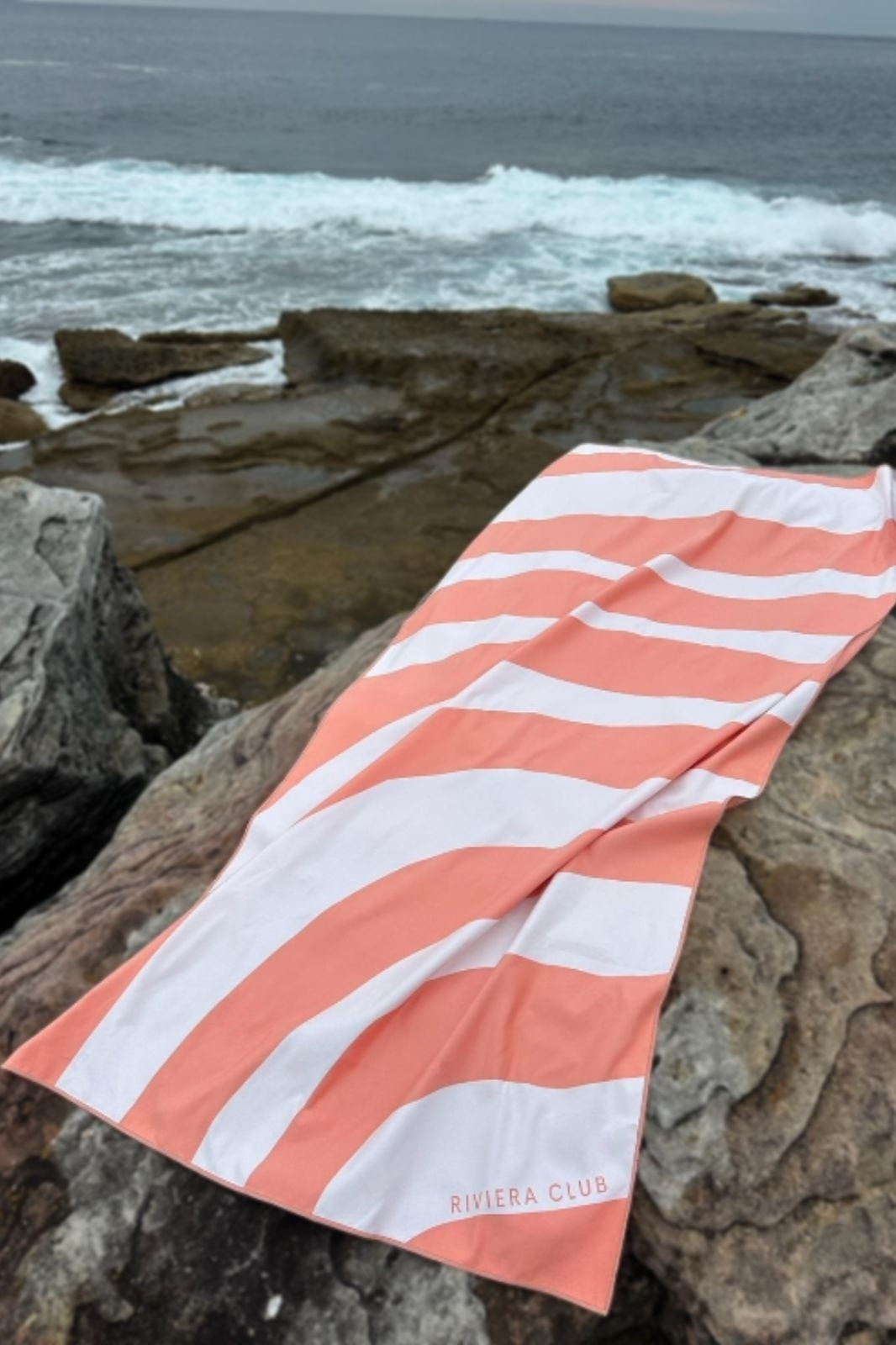 Coral wave beach towel